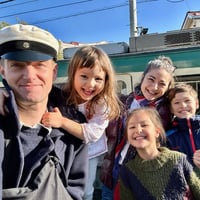 Anne-Yoshie Narahara and her husband and three kids on a boat.