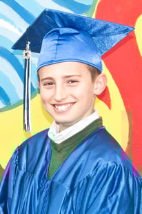 Graduation photo of Arthur from INTL.