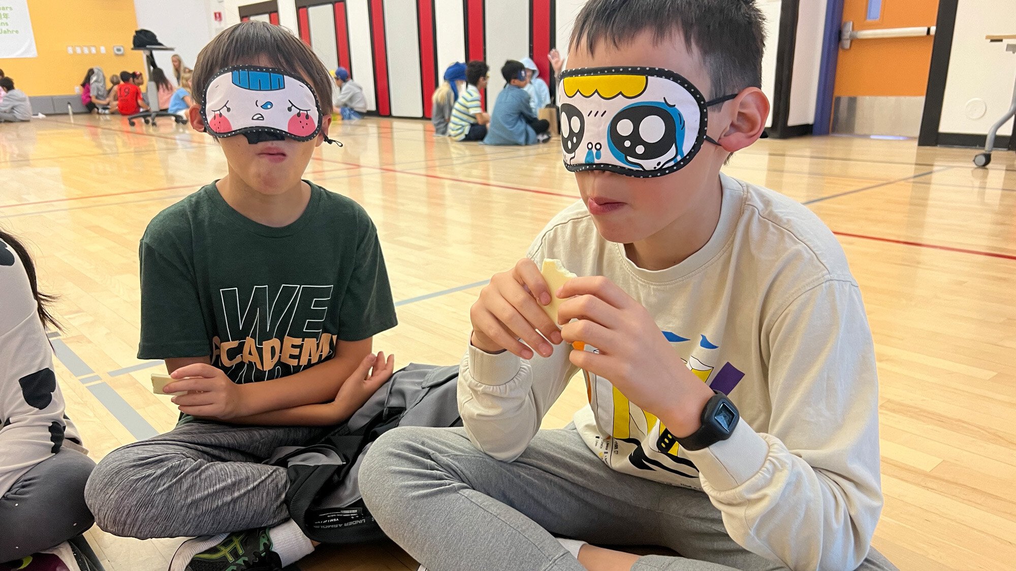 Students blind taste testing food