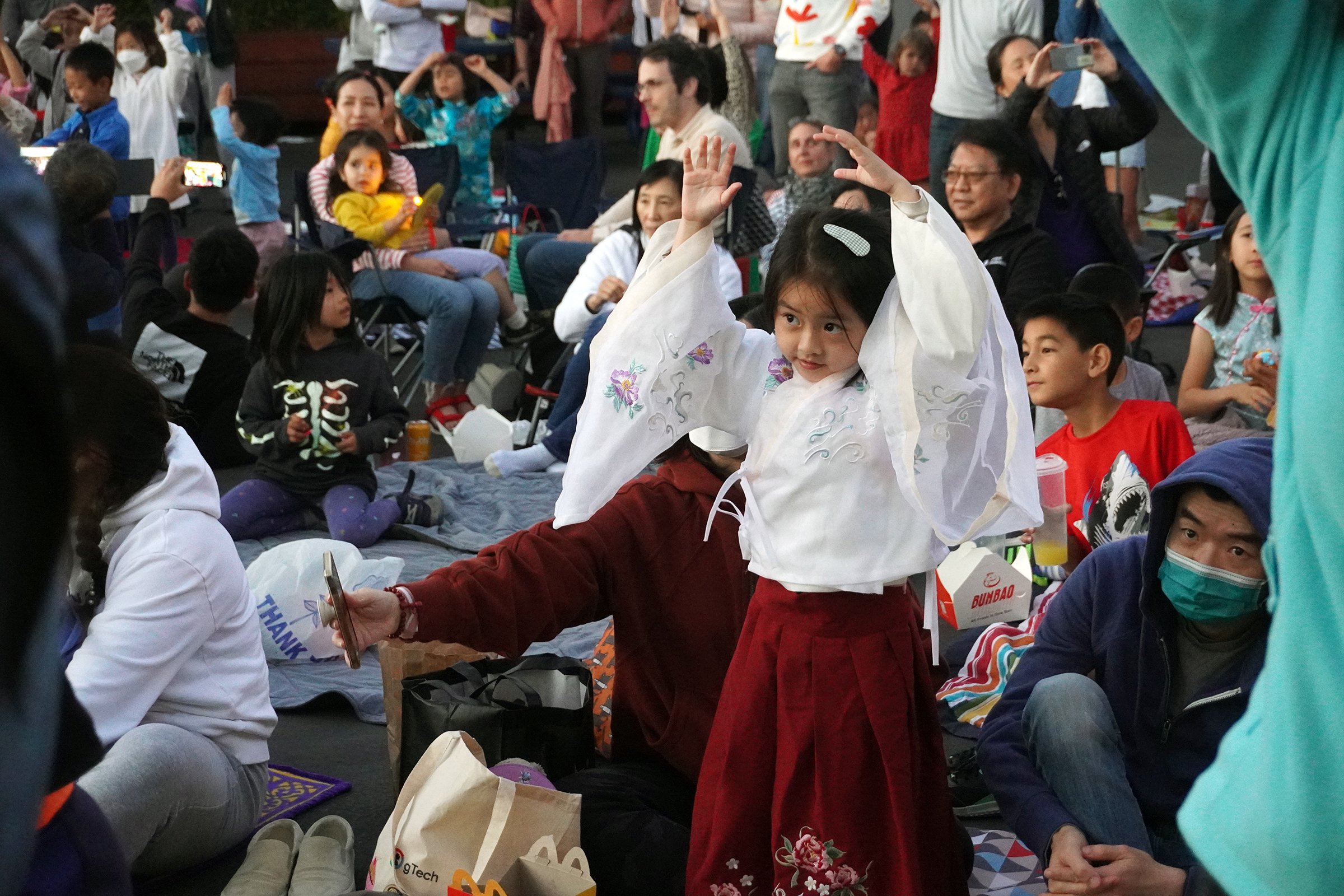 Celebrating the moon festival with a traditional dance to Lady Moon.