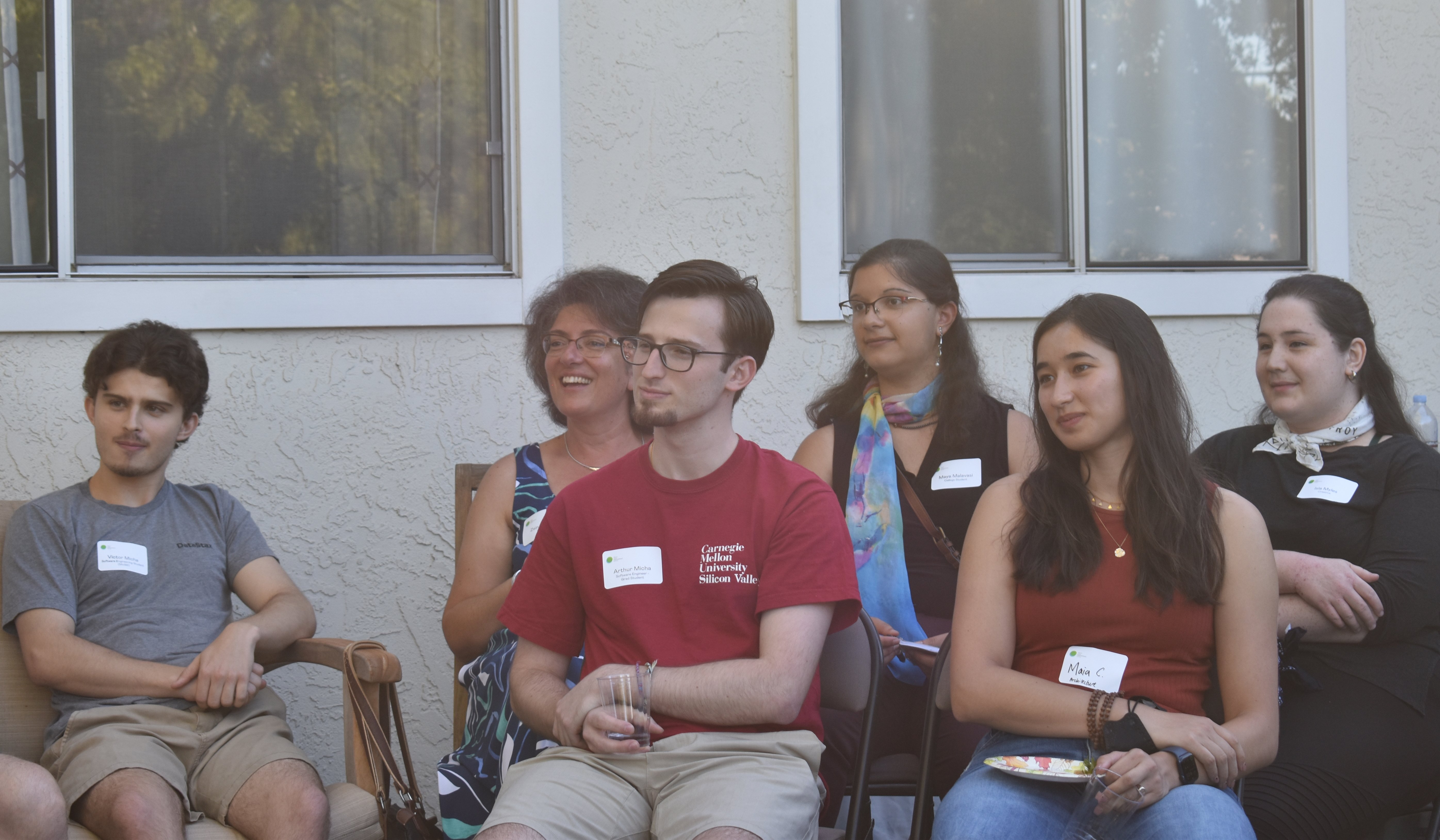 An audience of INTL alums and parents listening at the first INTL Connect event of the year