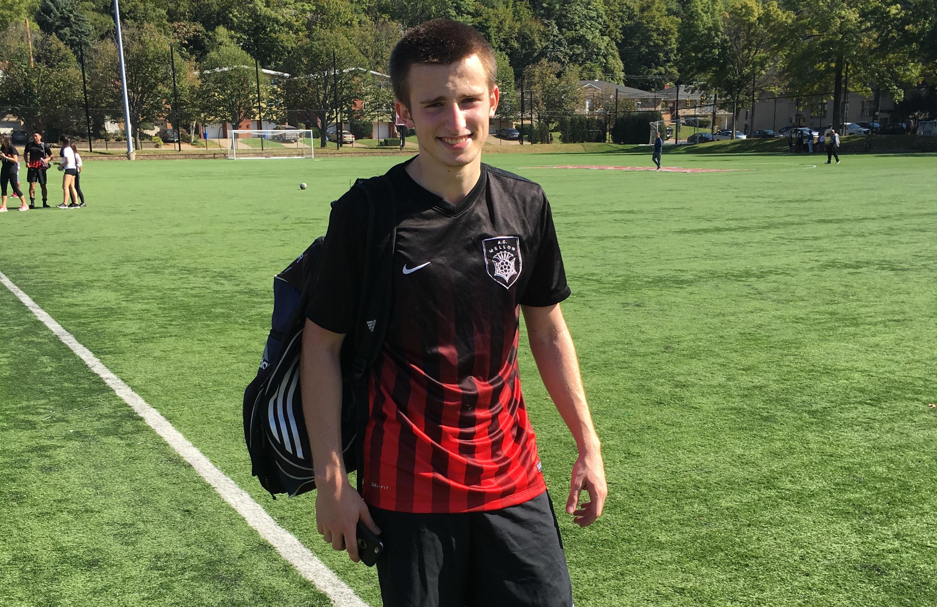 Arthur wearing his soccer kit in college.