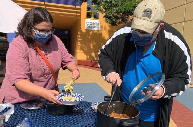 Parents serving traditional Hungarian Gulasch to the class.