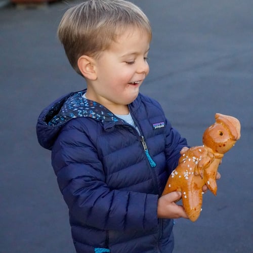 A child ready to eat his Sweet Breadman