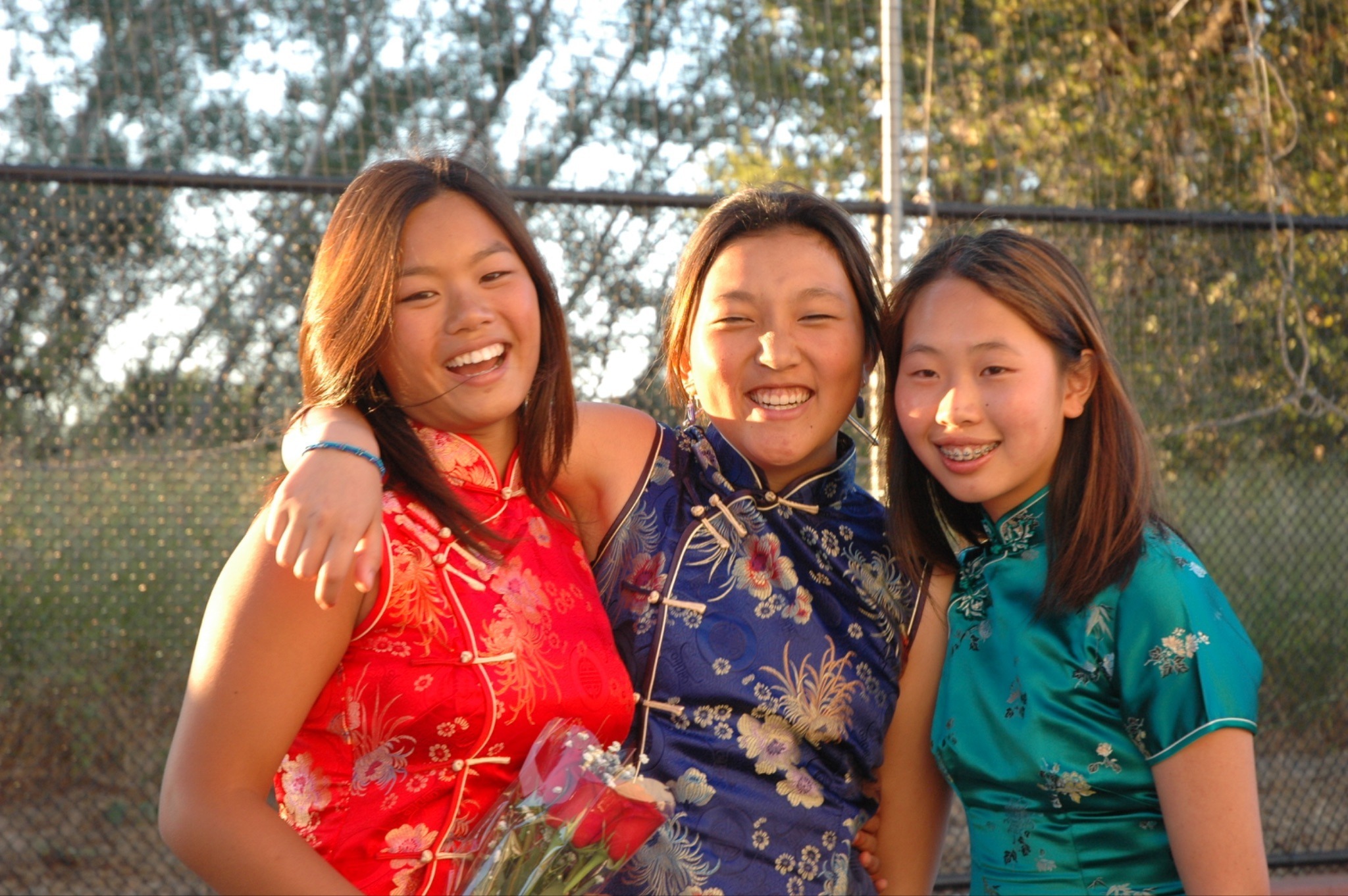 Sian and two friends in traditional chinese gowns at Moon Festival
