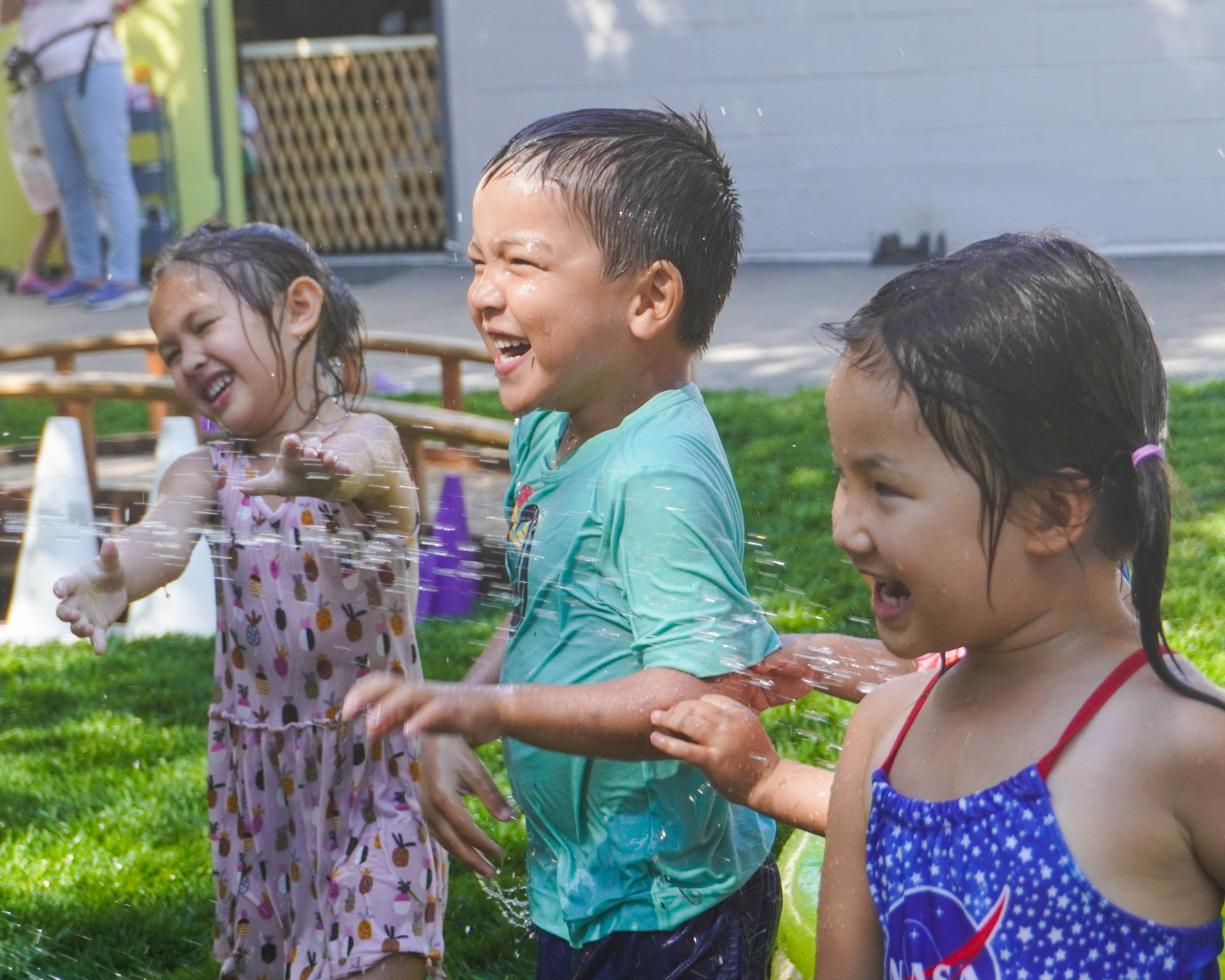 Water play brings smiles to the youngest students faces along with huge developmental benefits.