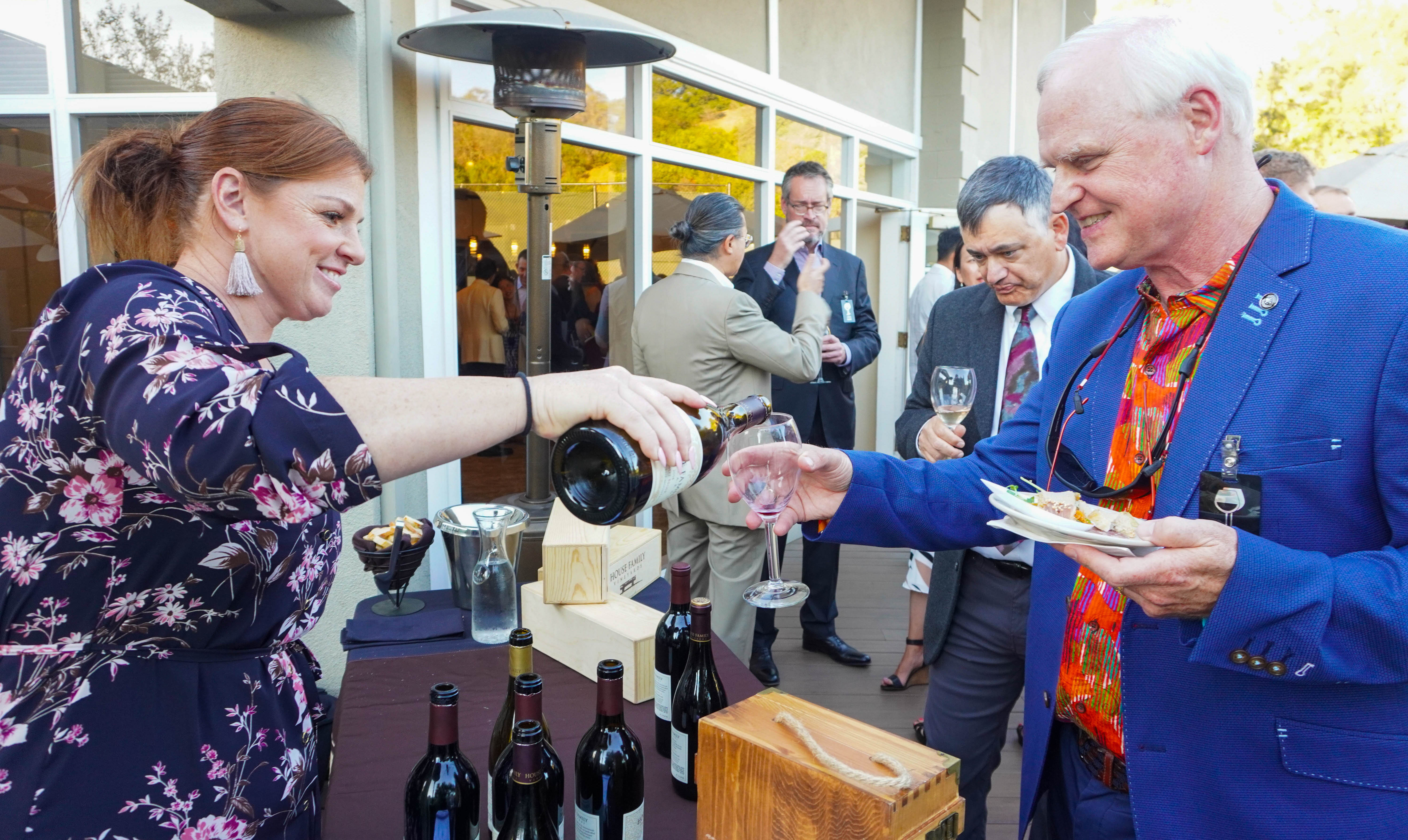 Vintners poured out selections of their wines for happy guests.